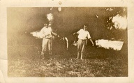 # 64  Q  (On reverse) "This is a picture of my brother and myself holding some of the fish we caught in New river.  I am standing to the left, my brother Laddie is standing to the right."  Nebraska?