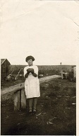 # 59  (On reverse) "The potato that I'm holding weighs 2 lbs.  To Elsie from Ruth W? or N?." (Ruth Wagoner ca 1925)