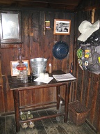 Kerosene lamp, bucket for hot water, wash basin, etc